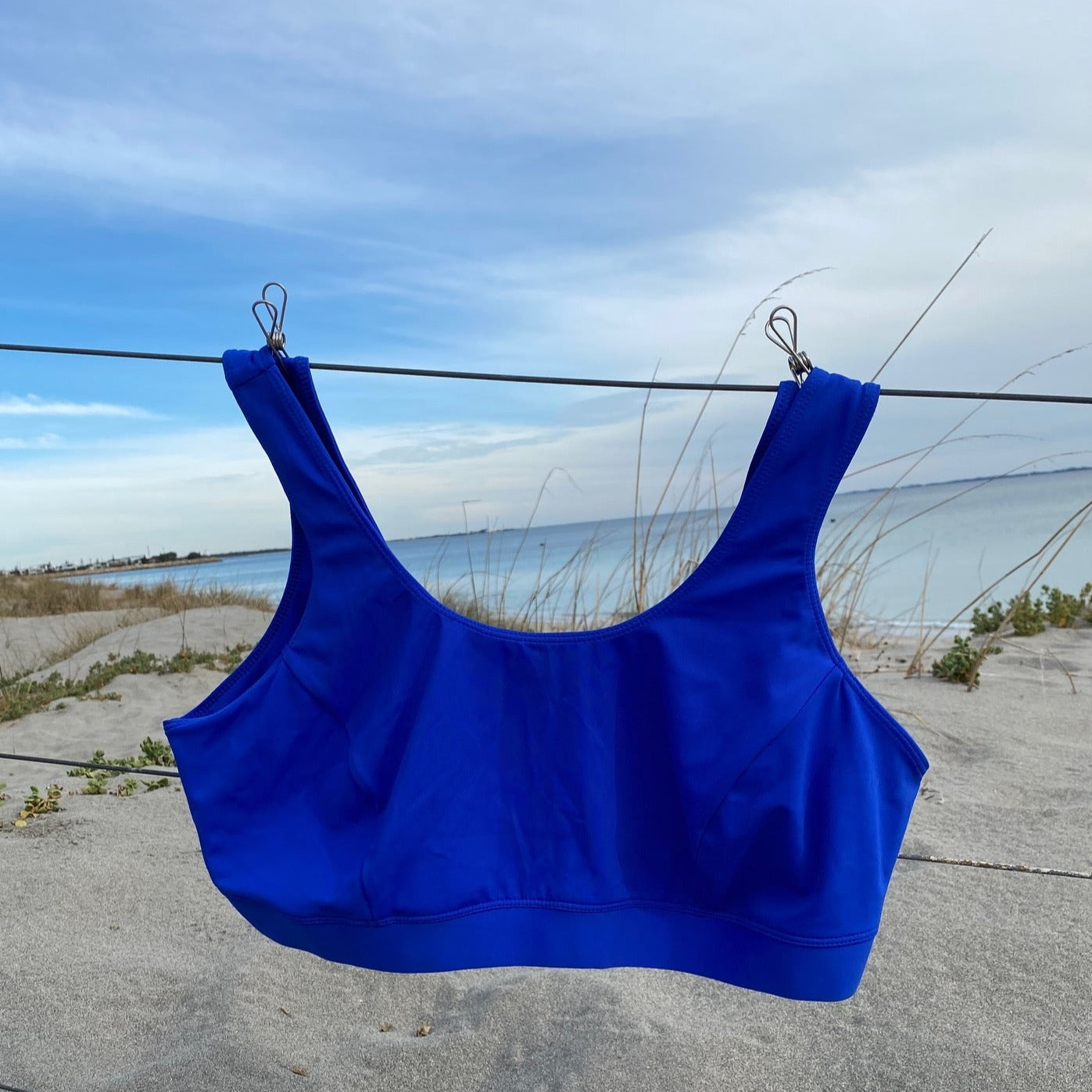 Ultramarine blue curvy crop top in Econyl recycled nylon fabric, suits B - DD cup... extra volume in the curve and a little higher so you don't have to worry about spilling out the top.