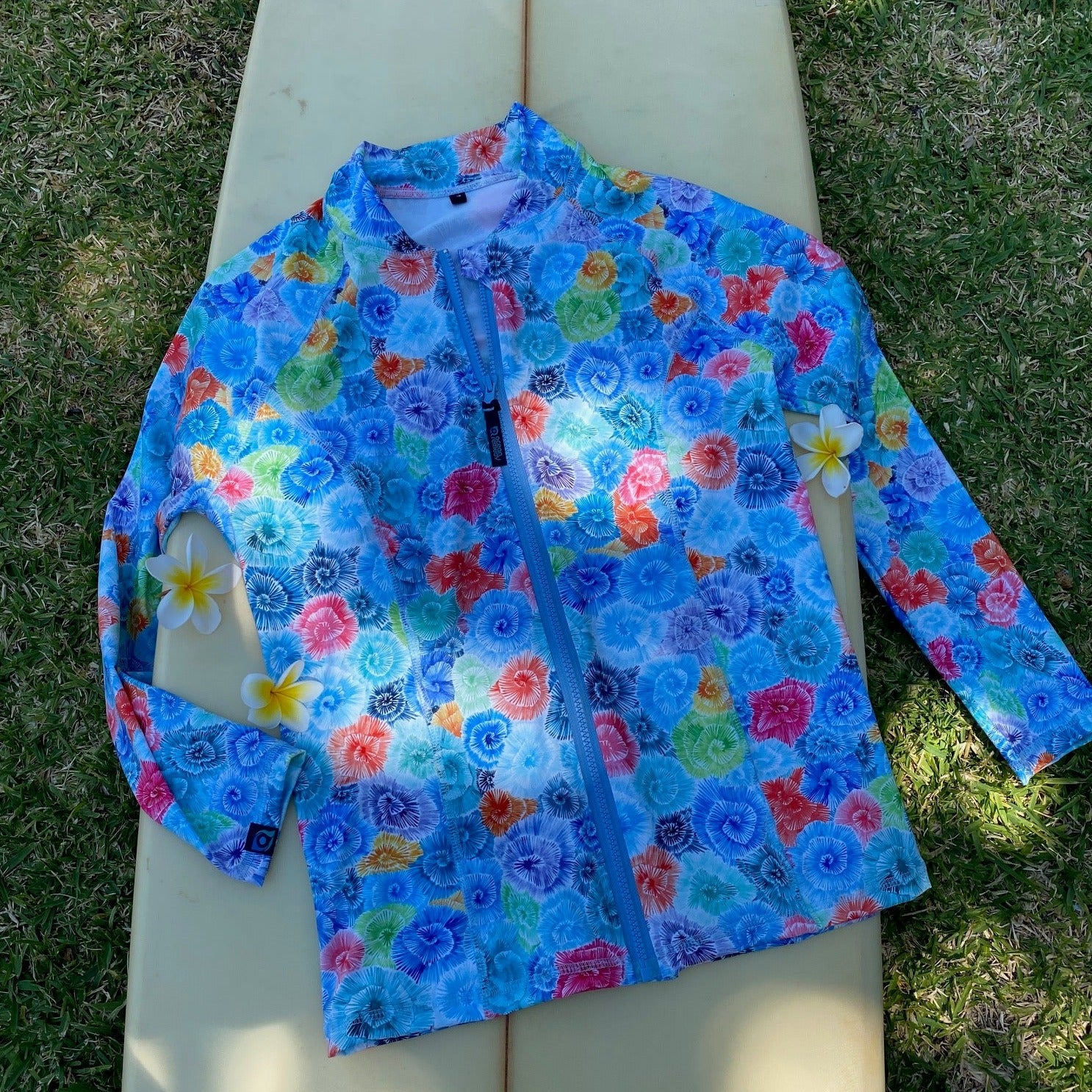 Montipora coral print by Sofie  Seyah recycled fabric rashie, full zipper, long sleeves, UPF50 plus.