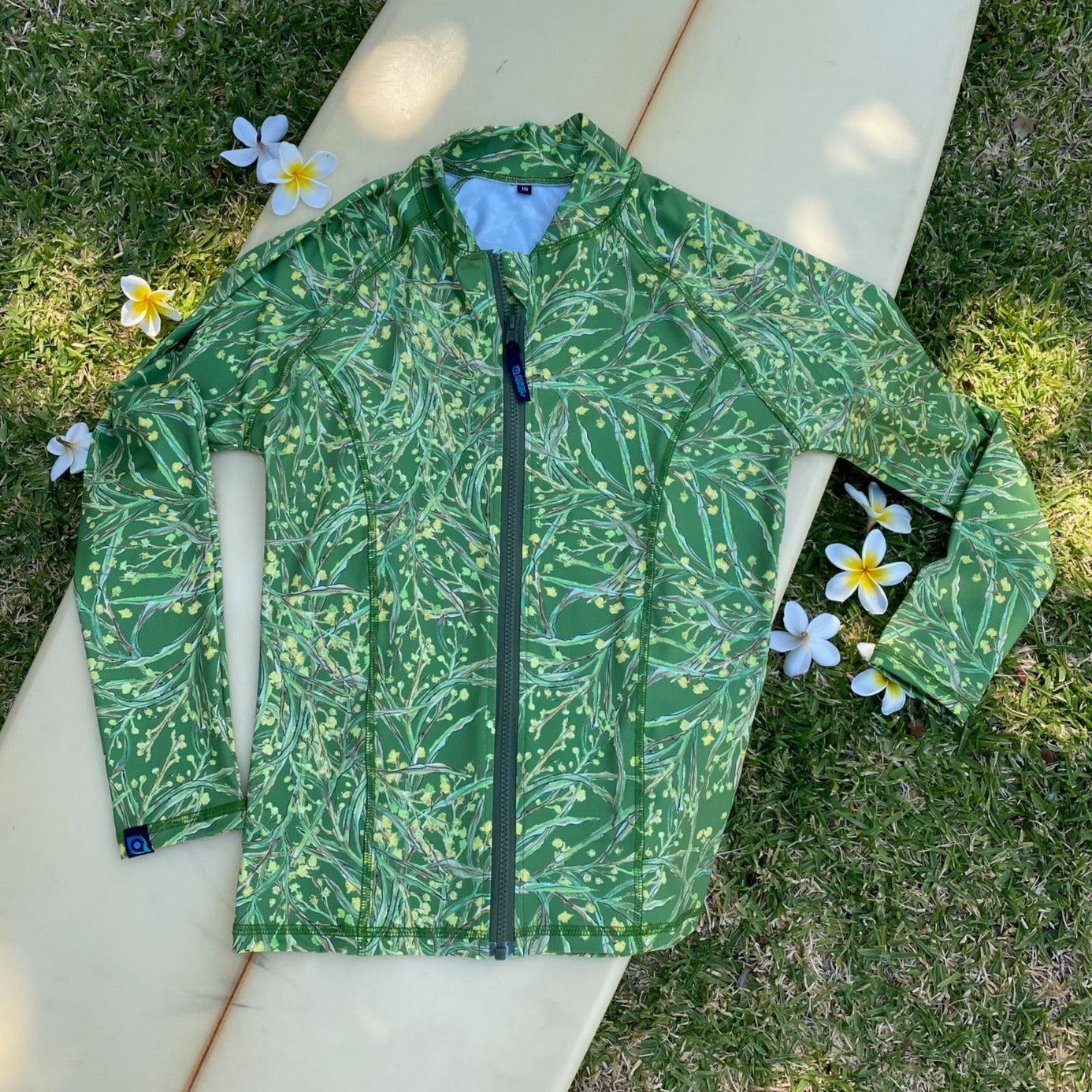 Wattle flower print by Kerry Beazley, long sleeved, zip front rashie.