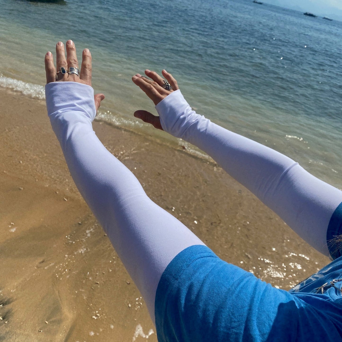 Long white sunsmart sleeves UPF50 plus for beach clean ups, tropical holidays and sport. 