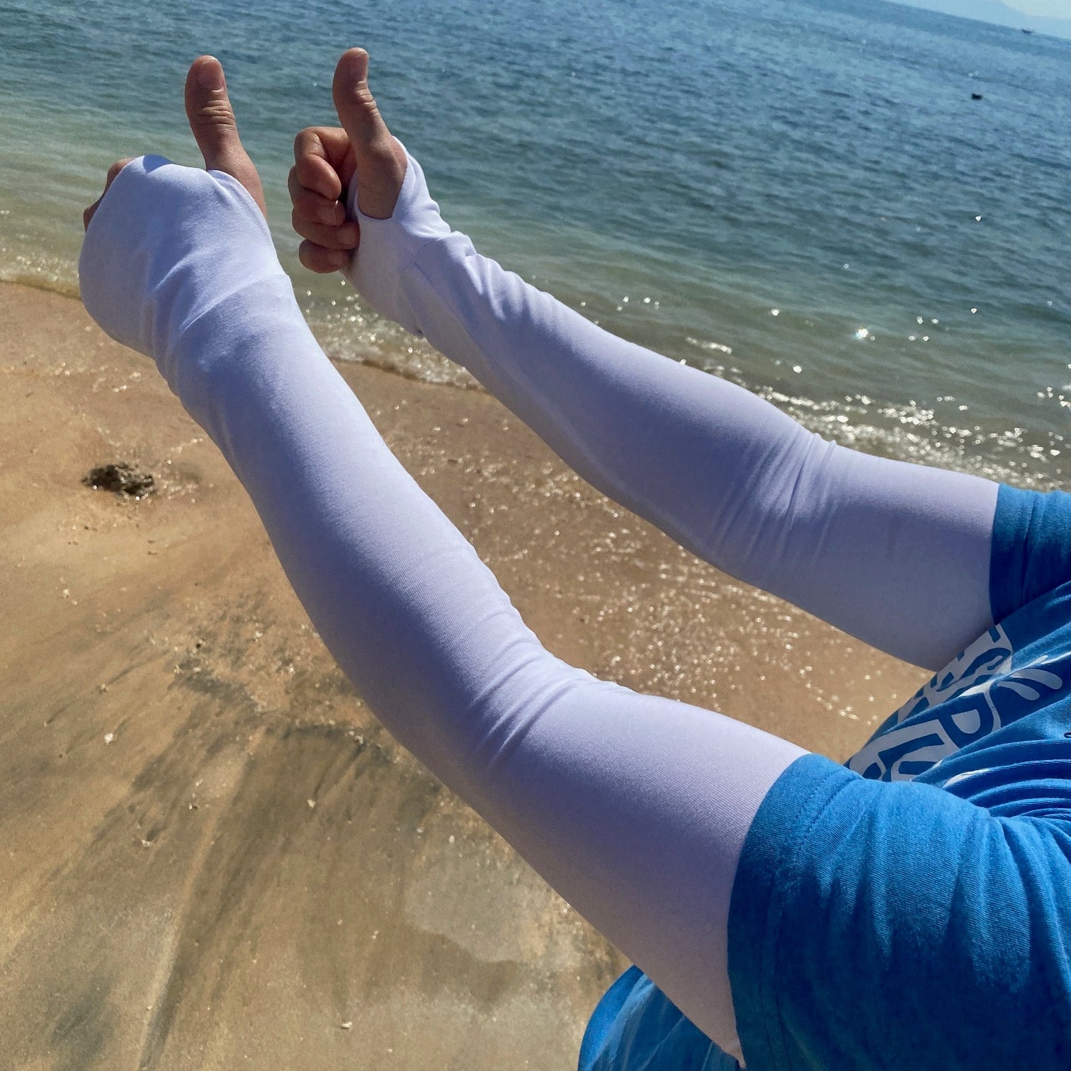 Long white sunsmart sleeves UPF50 plus for beach clean ups, tropical holidays and sport. 